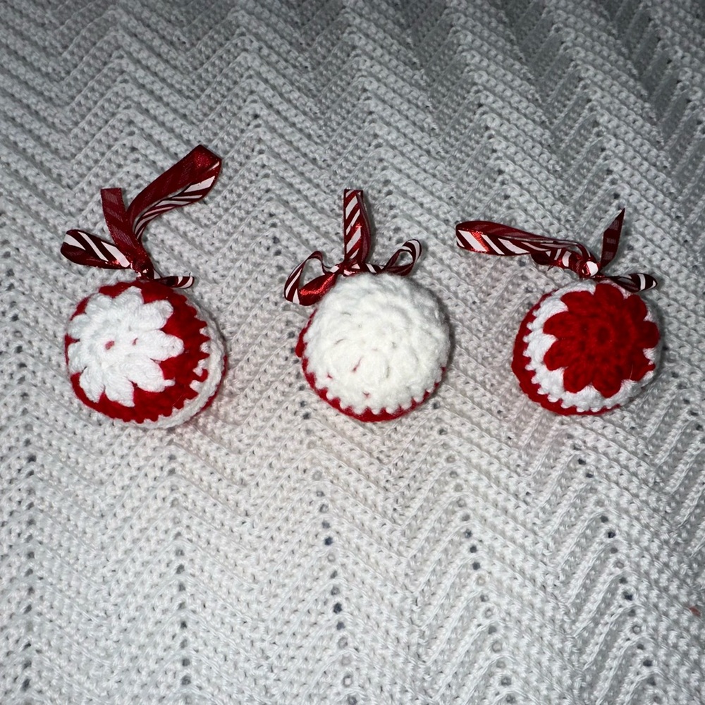 Three hand crocheted red and white Christmas ornaments - new